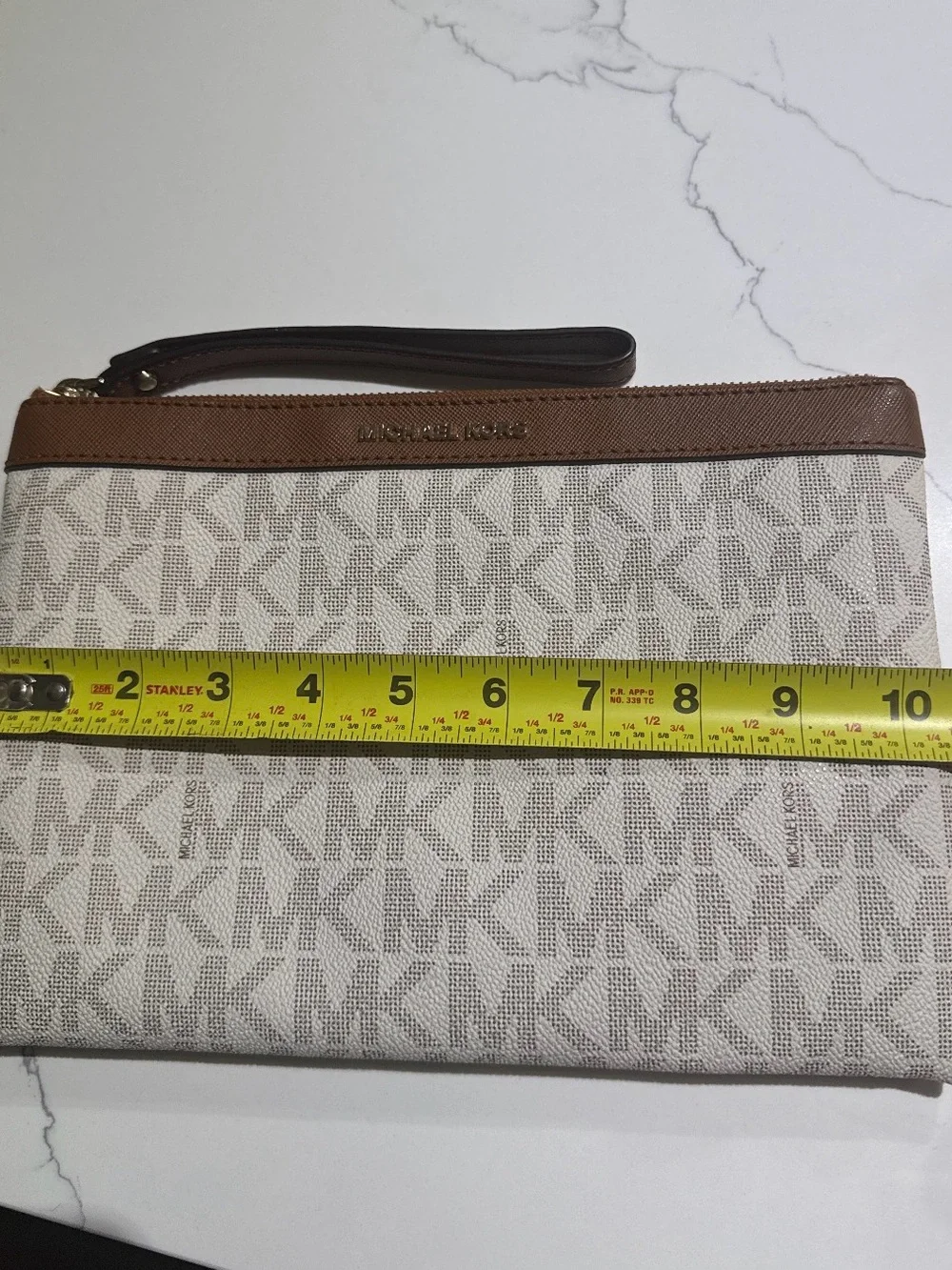 Michael Kors Beige MK Monogram clutch/wristlet with Brown Trim